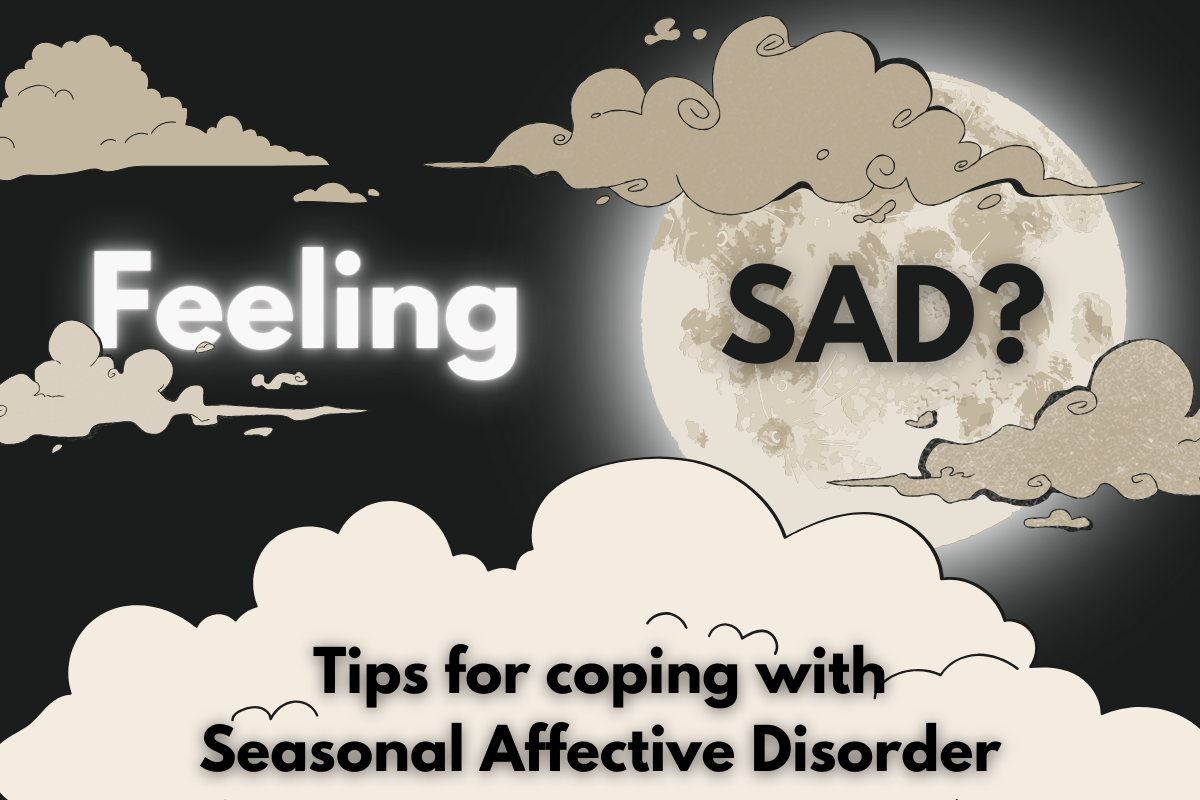 Feeling Sad? Tips for coping with Seasonal Affective Disorder (Clouds hide a bright moon in a dark sky)